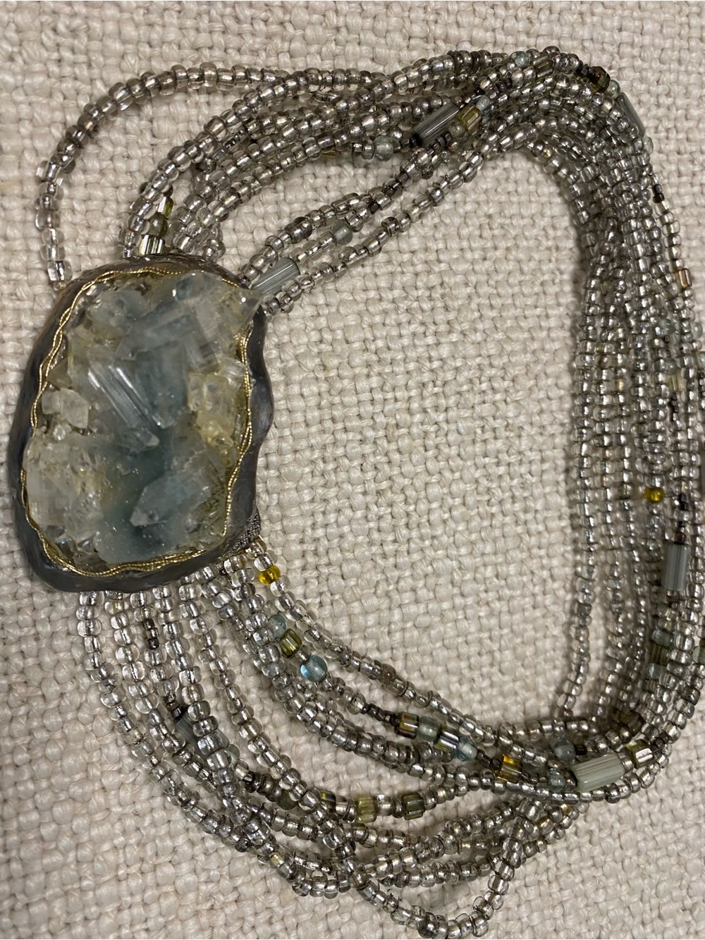 Multi-Strand Silver Beaded  necklace with Blue Crystal Pendant